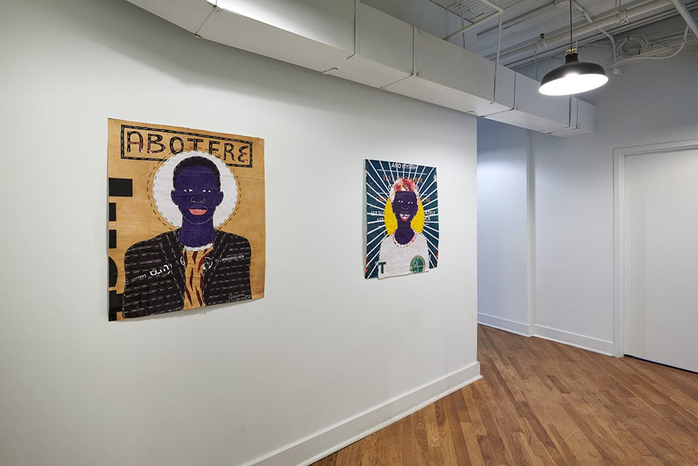 left: Solomon Adu, Qwaku Black (Abotere), 2023 Ballpoint pen on discarded vinyl banners with stitching, 36 x 29½ in. right: Solomon Adu, Uprising Smile, 2023, Ballpoint pen on discarded vinyl banners with stitching, 33½ x 31¼ in.